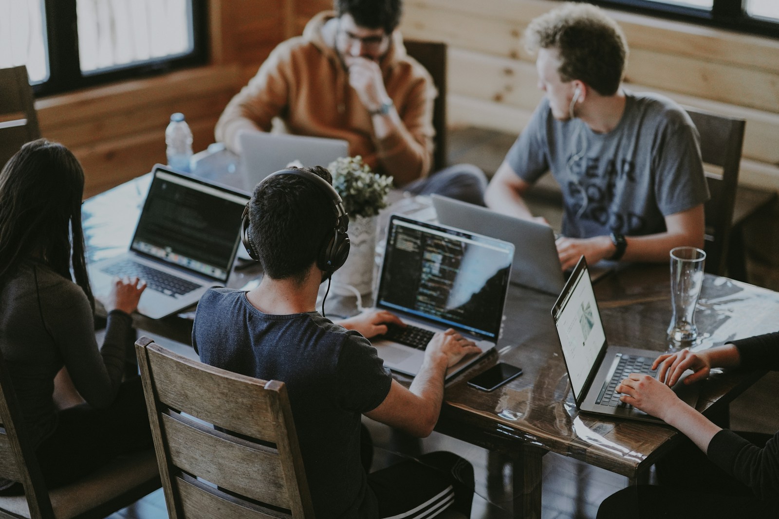 Colleagues working together in a relaxed, modern workplace